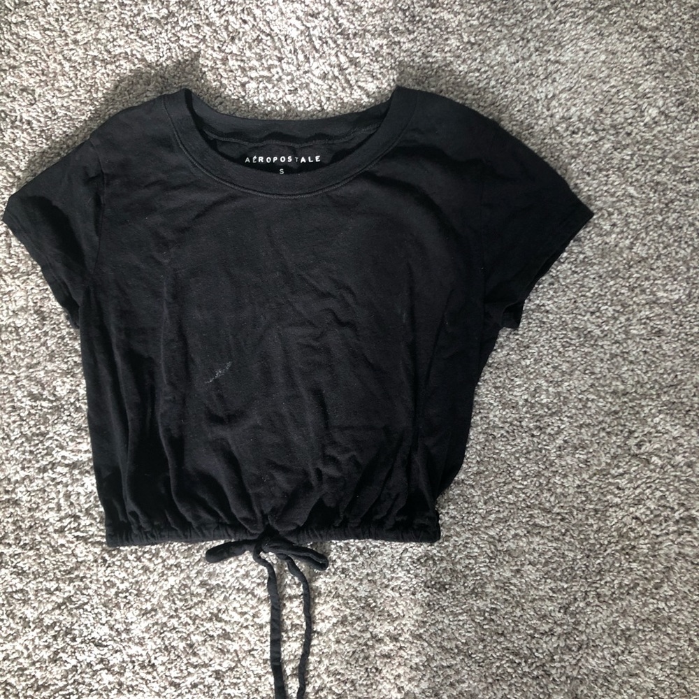 Super cute black top with tie in the front